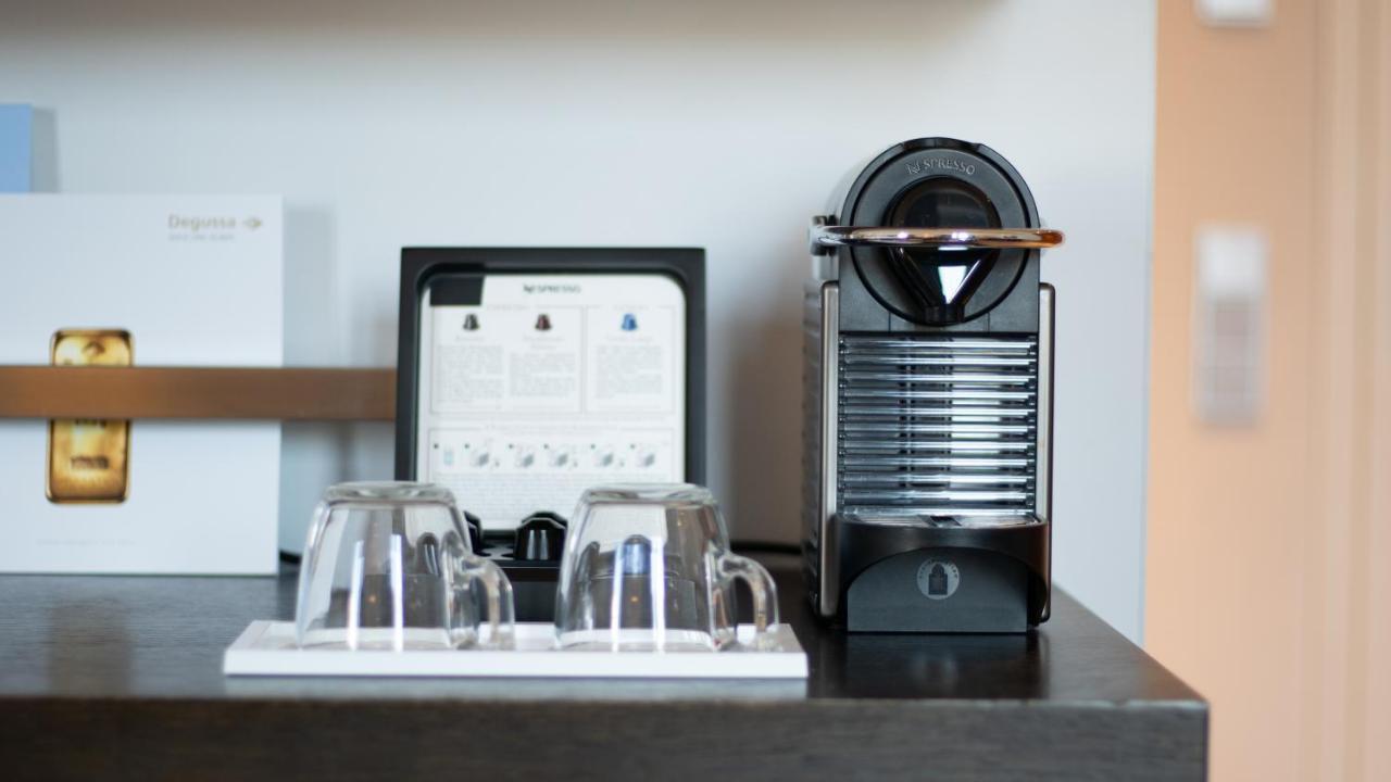 Hotel Maximilian’s Augsburg Exterior foto A Nespresso machine